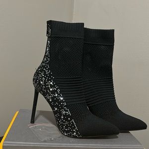 Rouge Helium black high heeled boots
Color: Black 
Size: 6